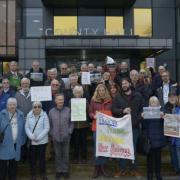 Residents protested against at County Hall in Trowbridge over plans to build 180 new homes at Southwick Court Fields.